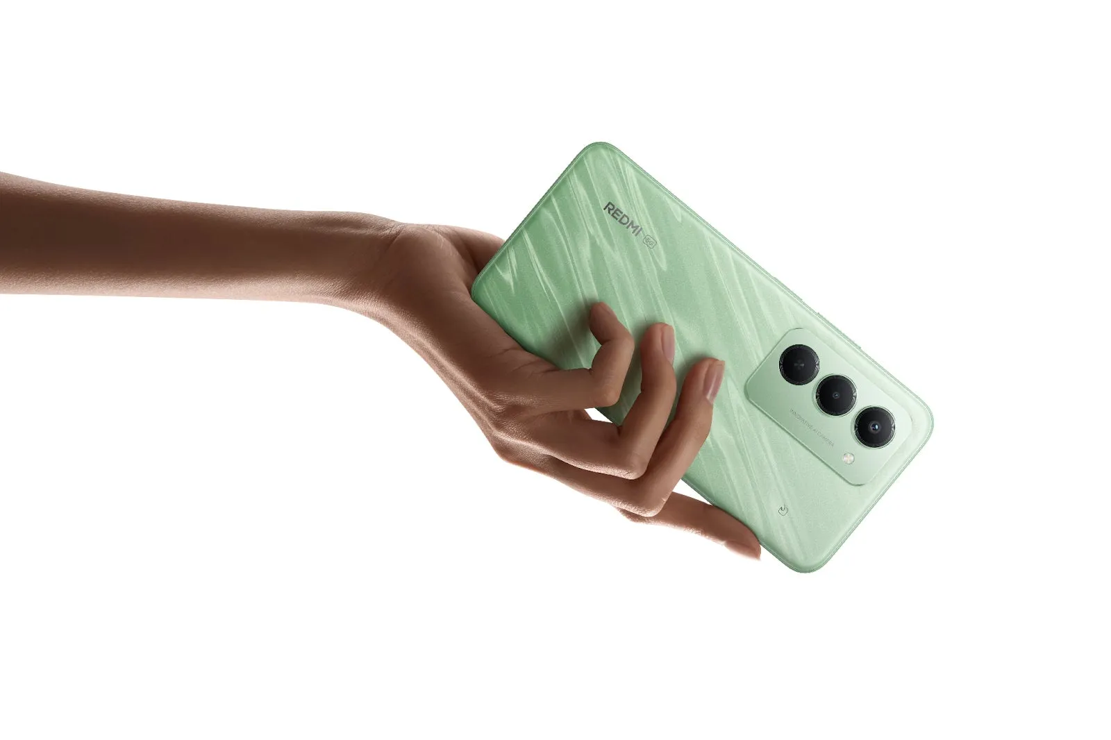 手で持たれた緑色のスマートフォン