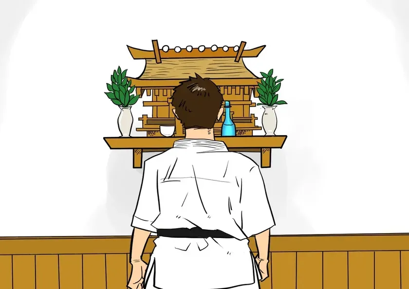 男性が神棚の前で手を合わせているイラストです。