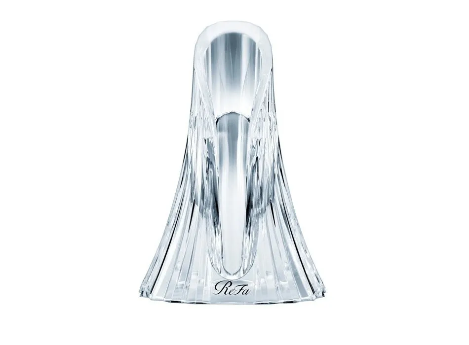 透明な美しいガラス製のReFaアイロンホルダーの容器が写っています。